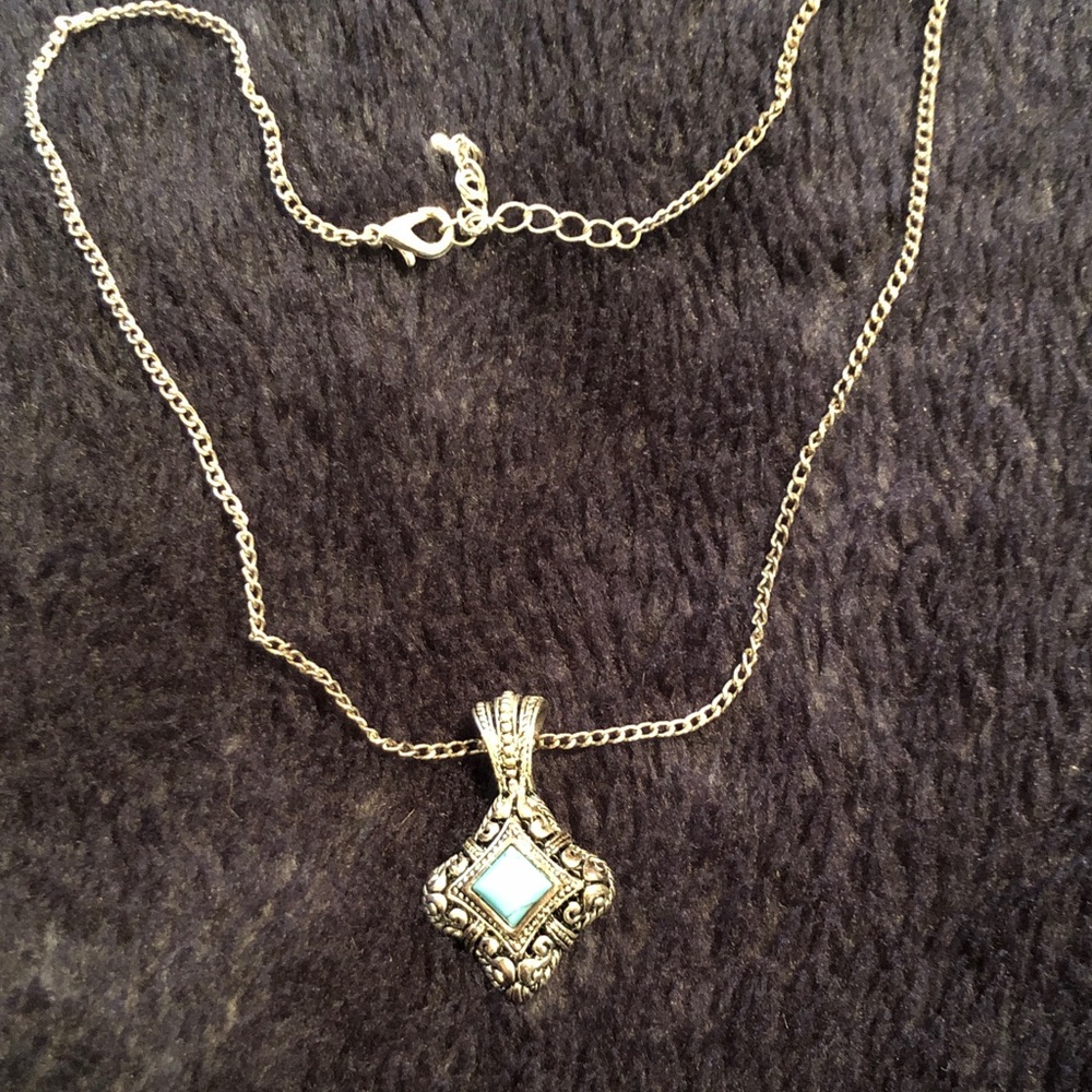 Elegant Silver and Turquoise Pendant Necklace